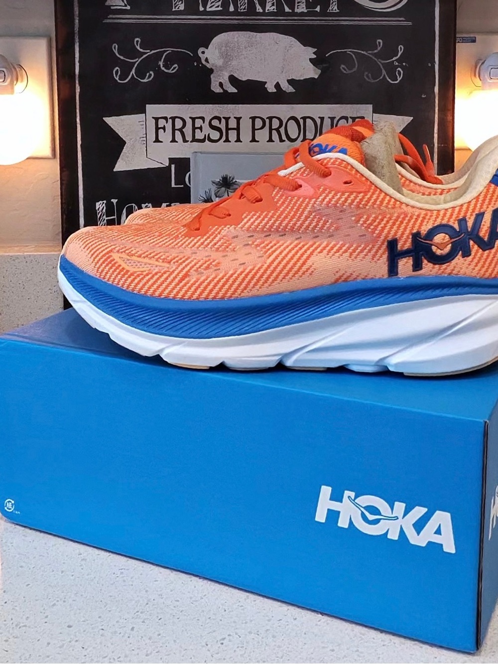Hoka Orange and Blue Running Sneaker